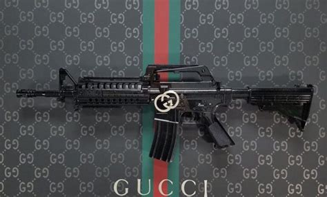 gucci golden gun|are Gucci guns expensive.